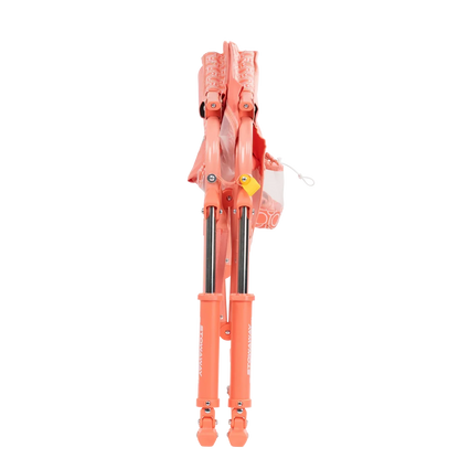 Folded view of the Coral Mosaic Stowaway Rocker. 